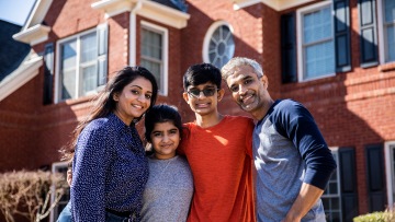 Family saving money on energy bills
