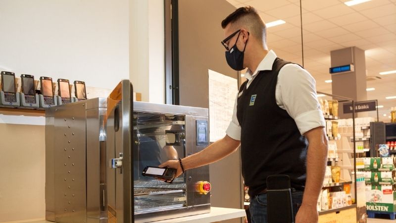 UV-C disinfection chamber being used to disinfect self-scanners at EDEKA&rsquo;s supermarket in Hamburg