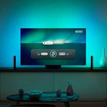 Philips Hue Sync TV app screen on TV in living room