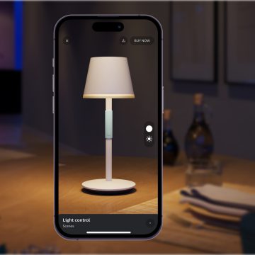 Mobile phone showing smart table lamp in augmented reality