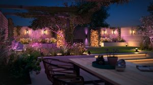 Garden illuminated by a selection of Philips Hue smart outdoor lighting