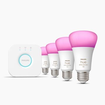 Philips Hue smart bulbs and Bridge on white background