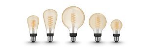 A set of filament bulbs in various shapes and sizes with visible spiral filaments and amber glass, labeled ""Hue white.""