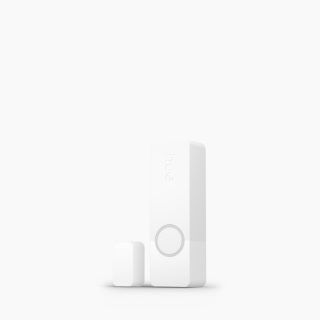 White rectangular smart security contact sensor with matte finish, compact design, circular feature, and embossed ""hue"" text.