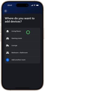 De hue-app toont het scherm Voeg apparaten toe aan kamer en laat de gebruiker een kamer kiezen