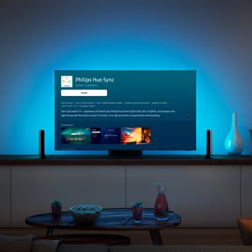 Ecranul aplicației Philips Hue Sync TV pe televizorul din camera de zi